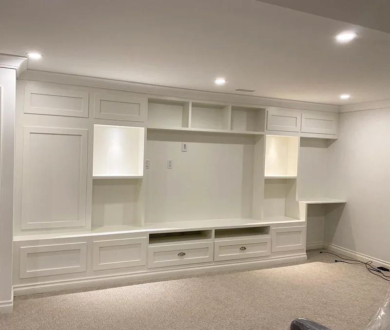 High-end custom carpentry and wall trim installation in a luxury interior